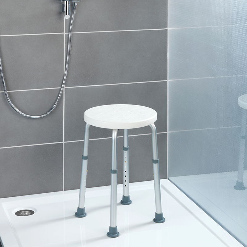 Taburete de baño regulable WENKO serie Secura