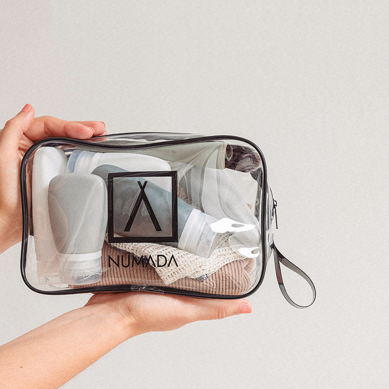 Neceser transparente con 5 botes de silicona